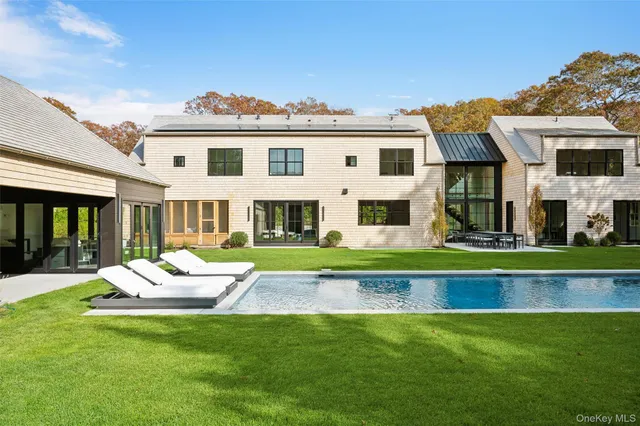 a front view of a house with swimming pool