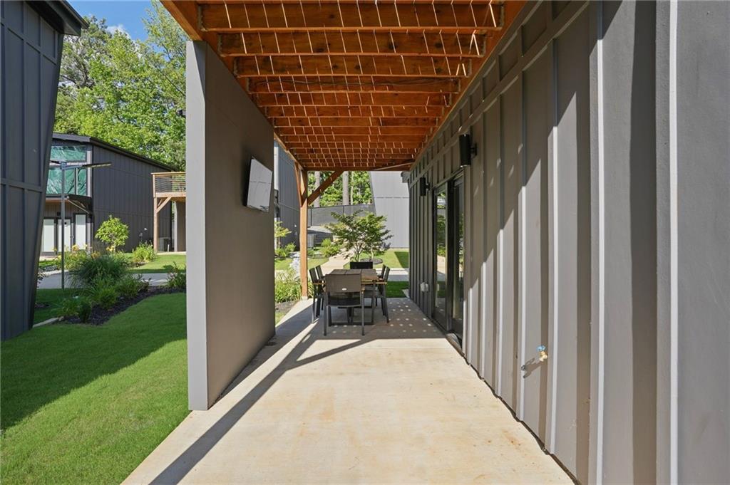 3120 Godby Road, Unit 1107 Atlanta, GA 30349 - Photo 26 of 29 a porch with seating space