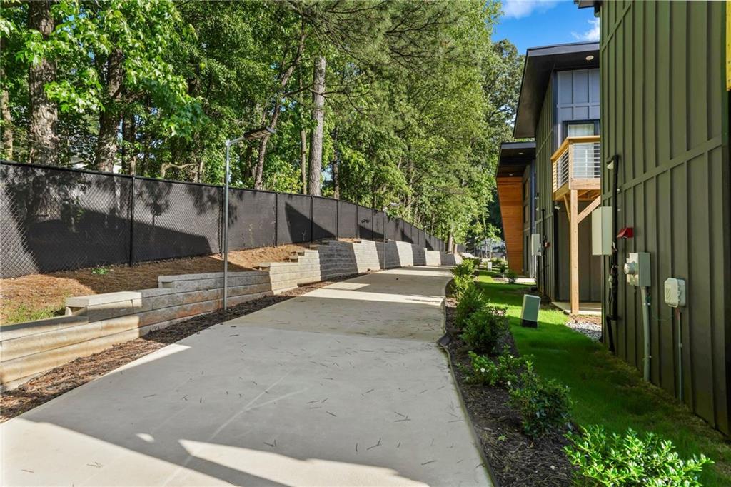 3120 Godby Road, Unit 1107 Atlanta, GA 30349 - Photo 29 of 29 a view of a house with a yard