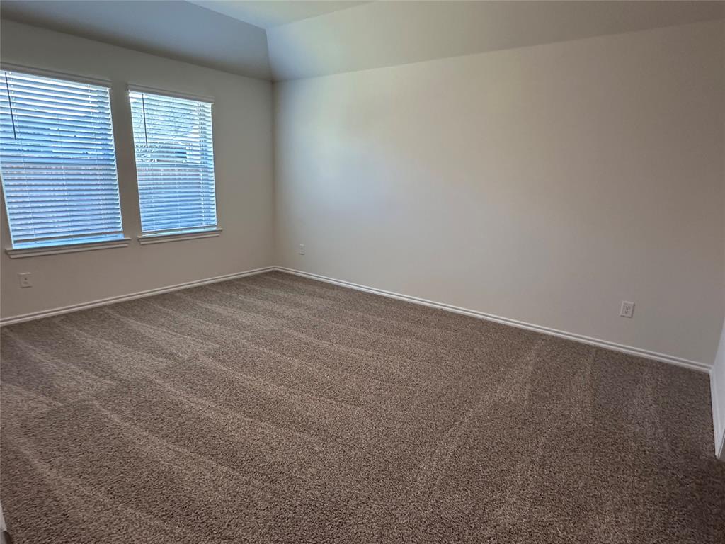 3917 Turquoise Avenue Celina, TX 75009 - Photo 6 of 19 an empty room with a window