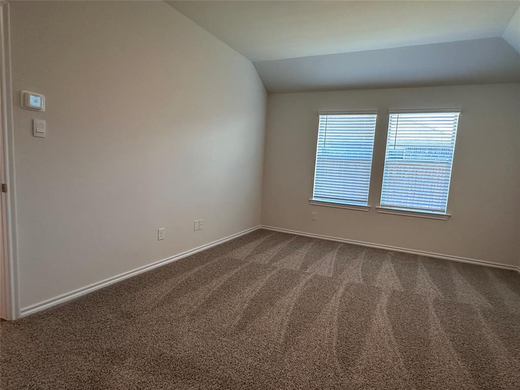 3917 Turquoise Avenue Celina, TX 75009 - Photo 7 of 19 an empty room with windows