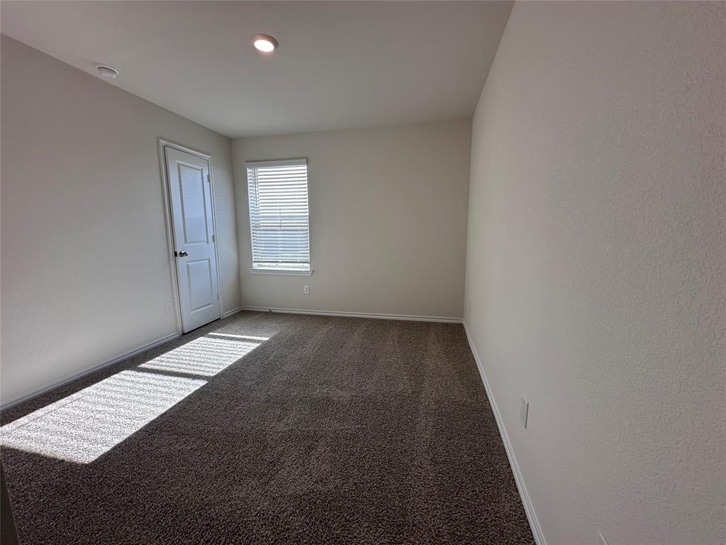 3917 Turquoise Avenue Celina, TX 75009 - Photo 10 of 19 an empty room with windows