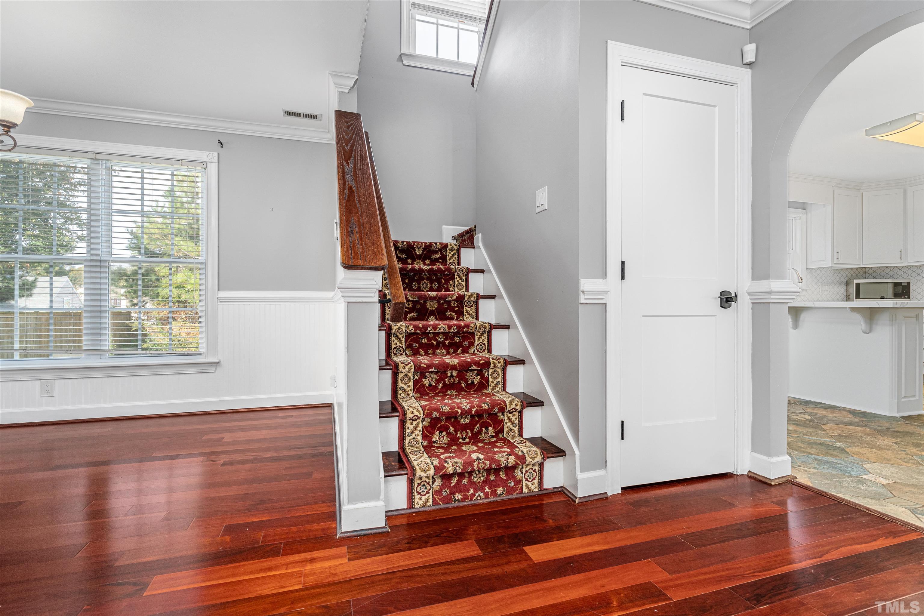 5219 Cardinal Grove Boulevard Raleigh, NC 27616 - Photo 20 of 43 wooden floor in an empty room with a window