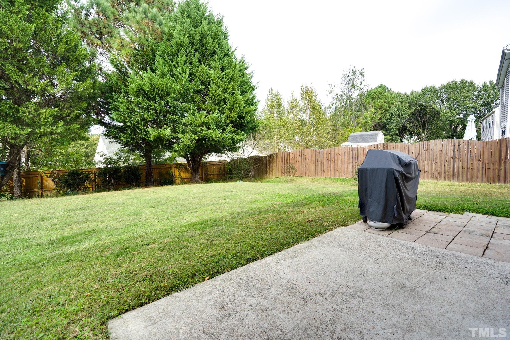 5219 Cardinal Grove Boulevard Raleigh, NC 27616 - Photo 43 of 43 a view of a garden with trees