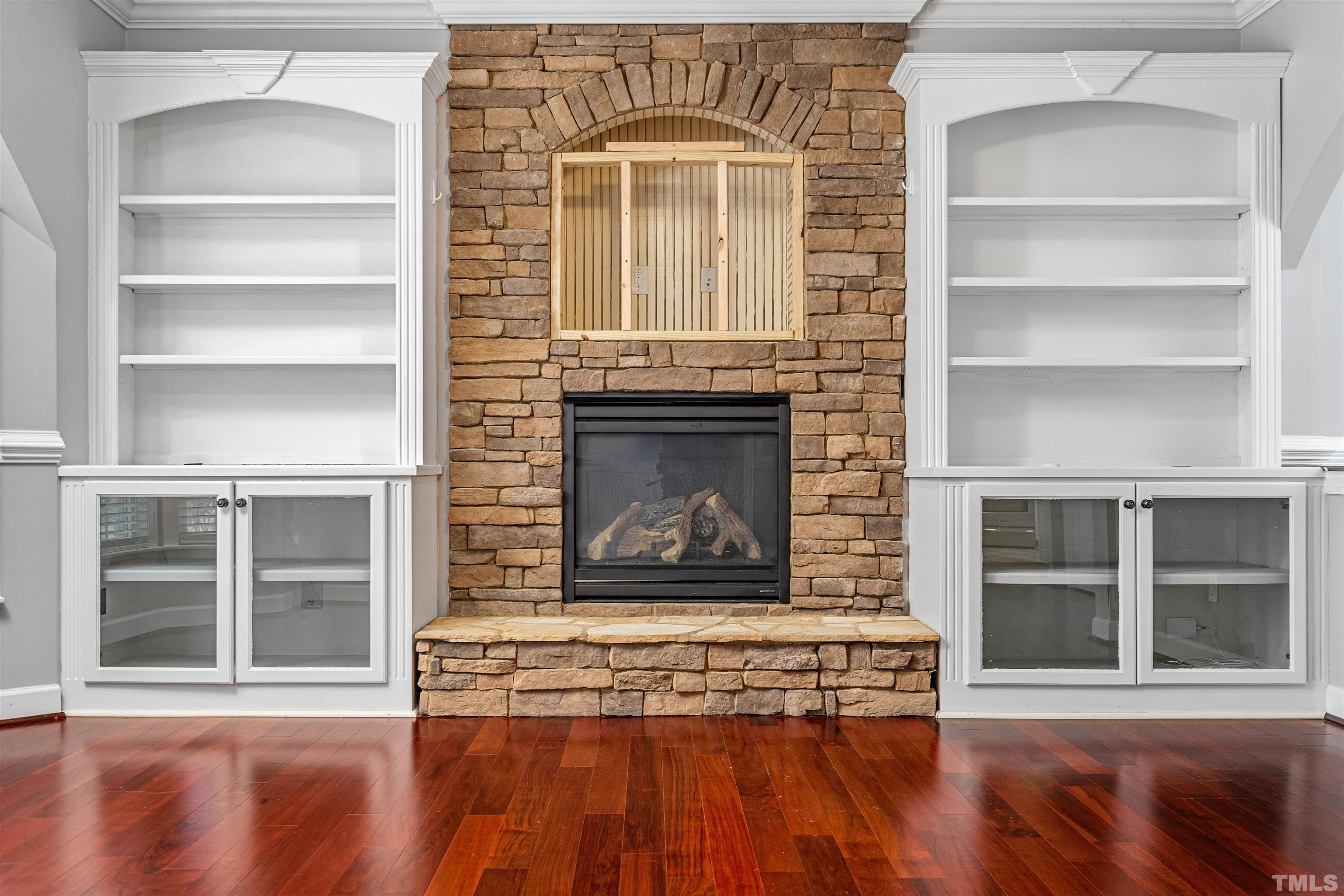 5219 Cardinal Grove Boulevard Raleigh, NC 27616 - Photo 8 of 43 a living room with a fireplace