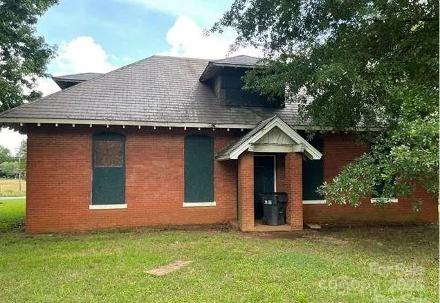 a house view with a garden space