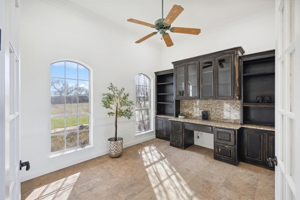 12886 St John Road Pilot Point, TX 76258 - Photo 7 of 35 a living room with stainless steel appliances furniture a chandelier and a view of kitchen