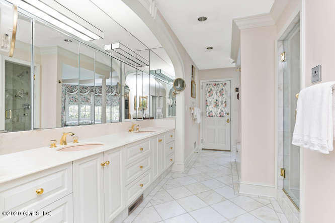191 Clapboard Ridge Road Greenwich, CT 06831 - Photo 13 of 23 a spacious bathroom with a double vanity sink and a mirror