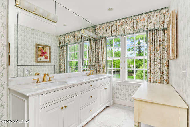 191 Clapboard Ridge Road Greenwich, CT 06831 - Photo 16 of 23 a kitchen that has a sink and a large window
