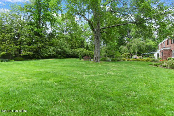 191 Clapboard Ridge Road Greenwich, CT 06831 - Photo 19 of 23 a view of a grassy field with trees