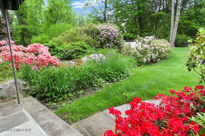 191 Clapboard Ridge Road Greenwich, CT 06831 - Photo 20 of 23 a view of a flower arrangement in backyard