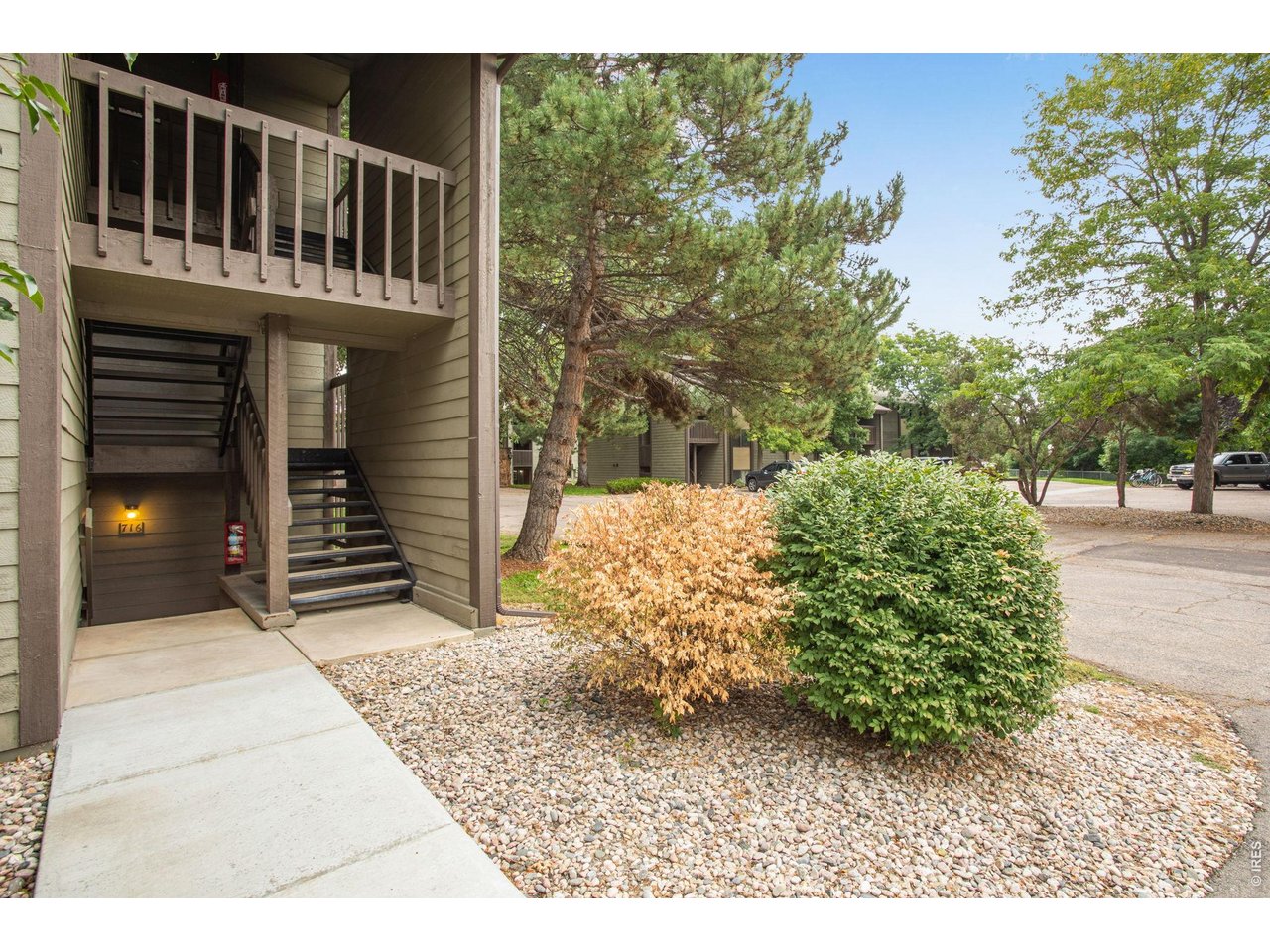 925 Columbia Road, Unit 716 Fort Collins, CO 80525 - Photo 2 of 19 End unit, garden level