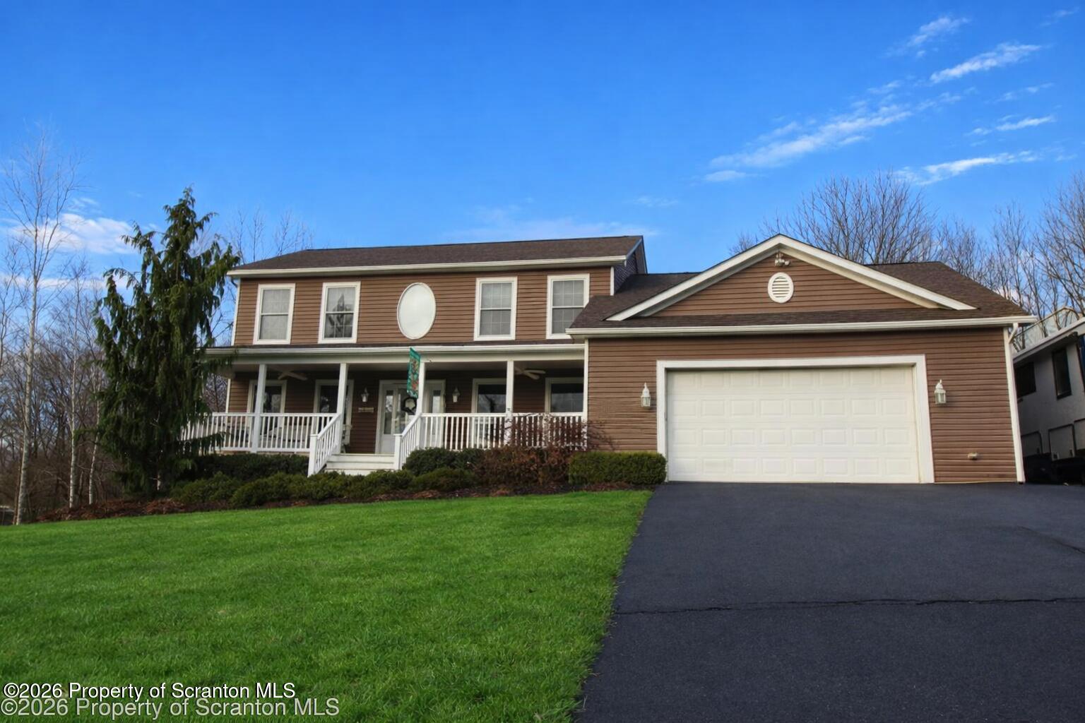 1611 Cherry Street Scranton, PA 18505 - Photo 1 of 86 a front view of a house with a yard