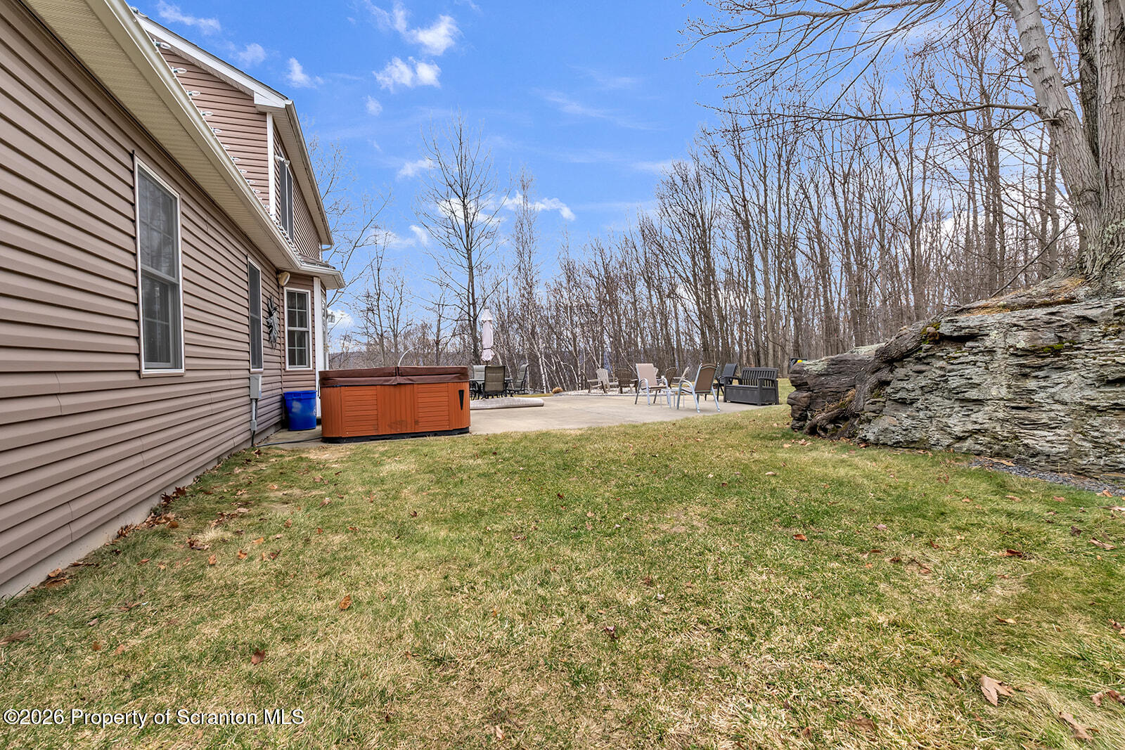 1611 Cherry Street Scranton, PA 18505 - Photo 19 of 90 a backyard of a house with a yard and outdoor seating