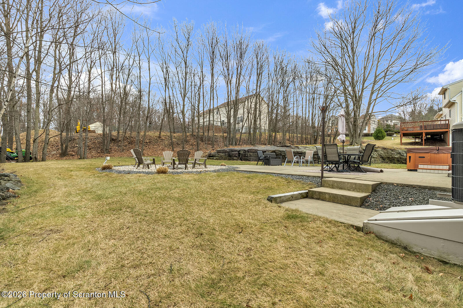 1611 Cherry Street Scranton, PA 18505 - Photo 23 of 90 a view of swimming pool with outdoor seating and trees in the background