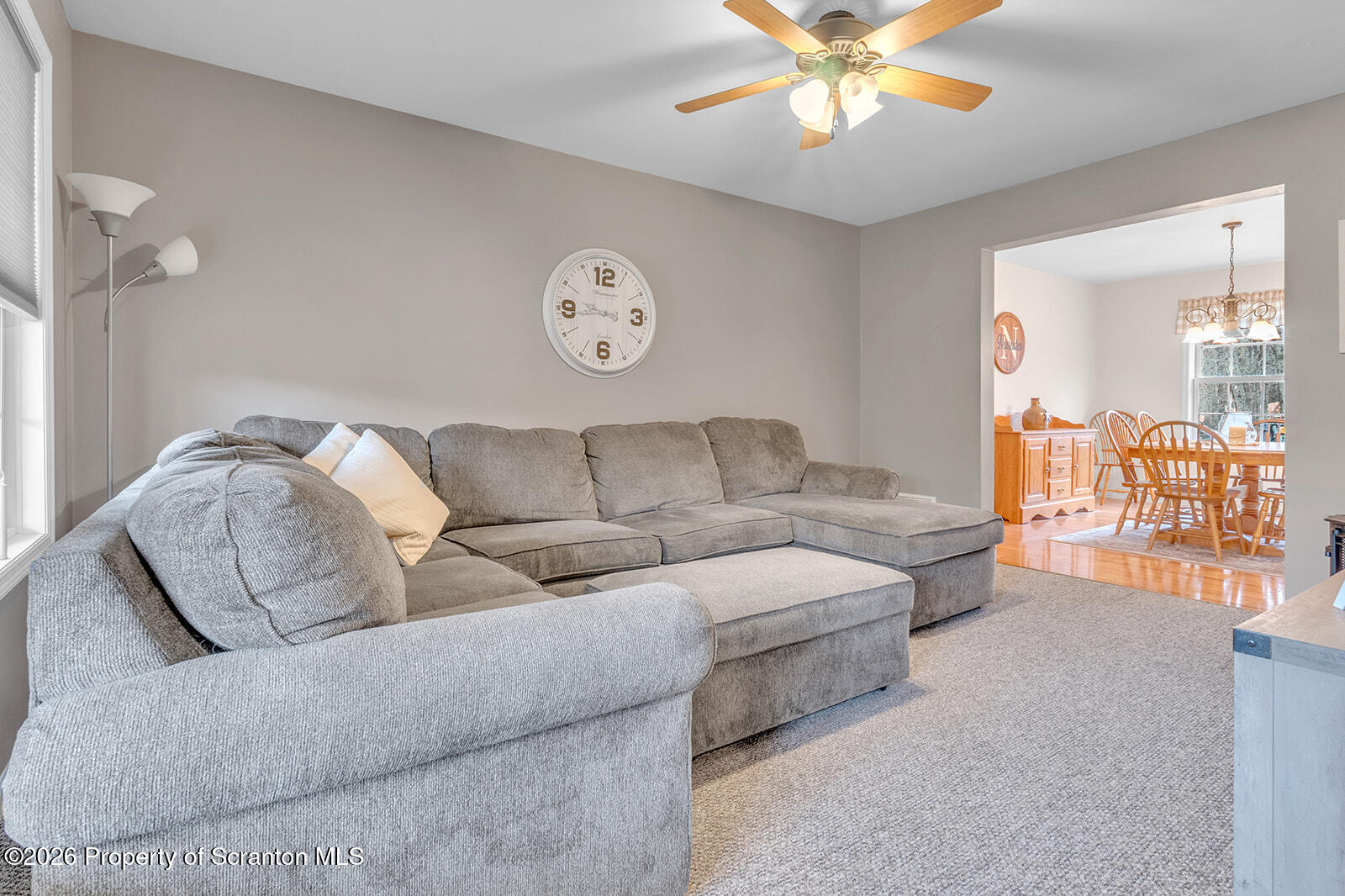 1611 Cherry Street Scranton, PA 18505 - Photo 27 of 86 a living room with furniture and a chandelier