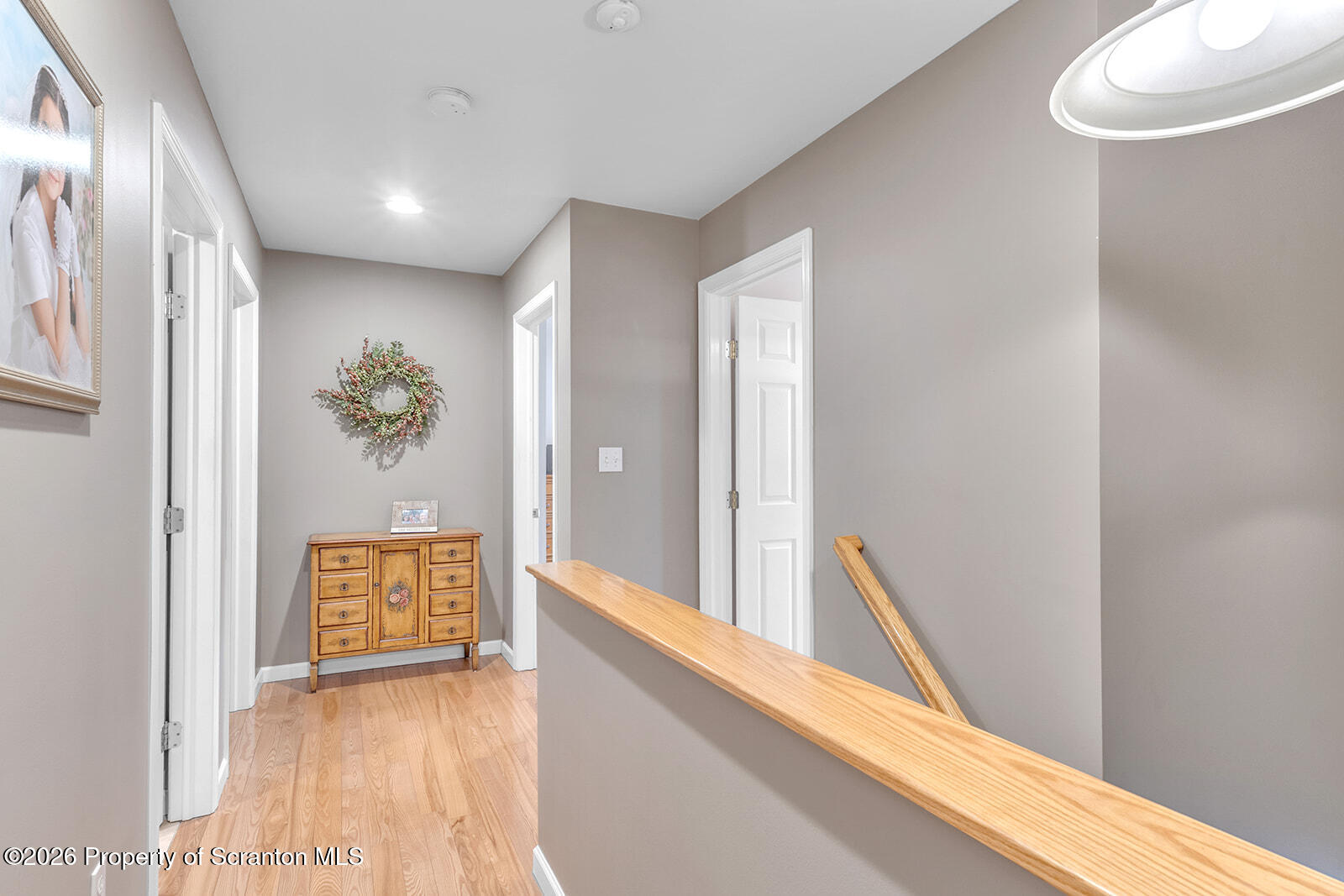 1611 Cherry Street Scranton, PA 18505 - Photo 53 of 90 a view of a hallway with wooden floor and cabinet