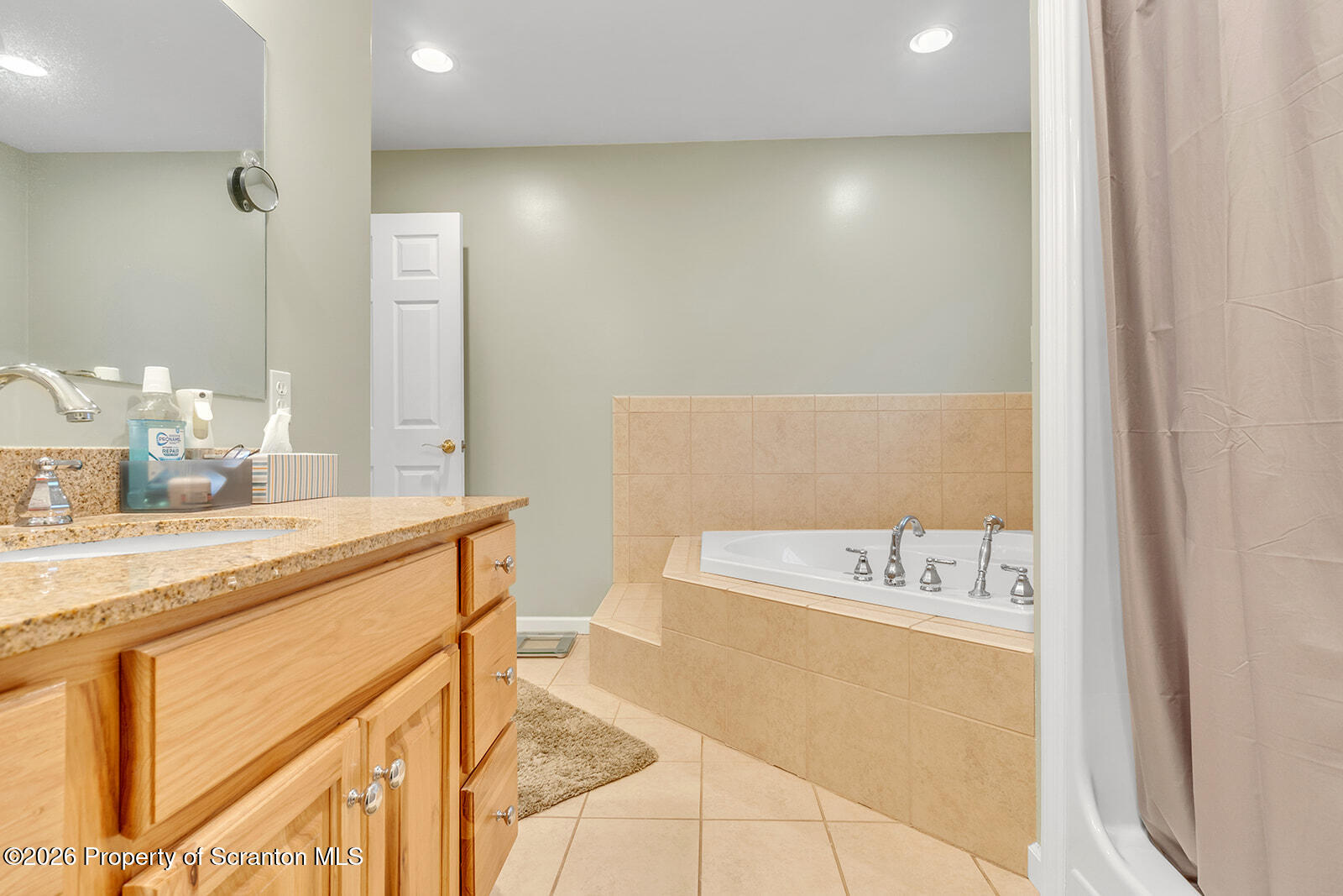 1611 Cherry Street Scranton, PA 18505 - Photo 58 of 86 a bathroom with a tub sink and mirror
