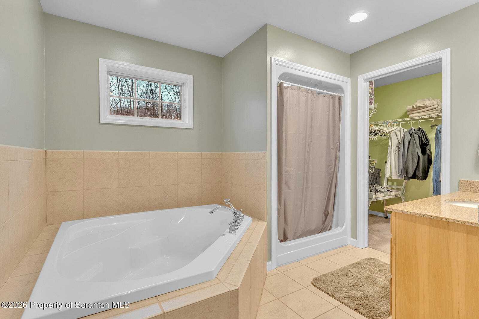 1611 Cherry Street Scranton, PA 18505 - Photo 59 of 86 a bathroom with a bathtub and a shower