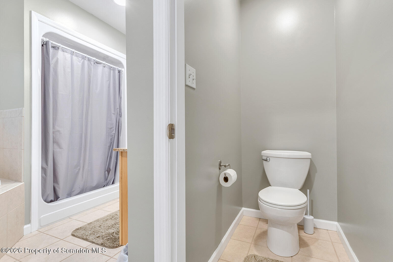 1611 Cherry Street Scranton, PA 18505 - Photo 60 of 86 a white toilet sitting next to a bathroom sink