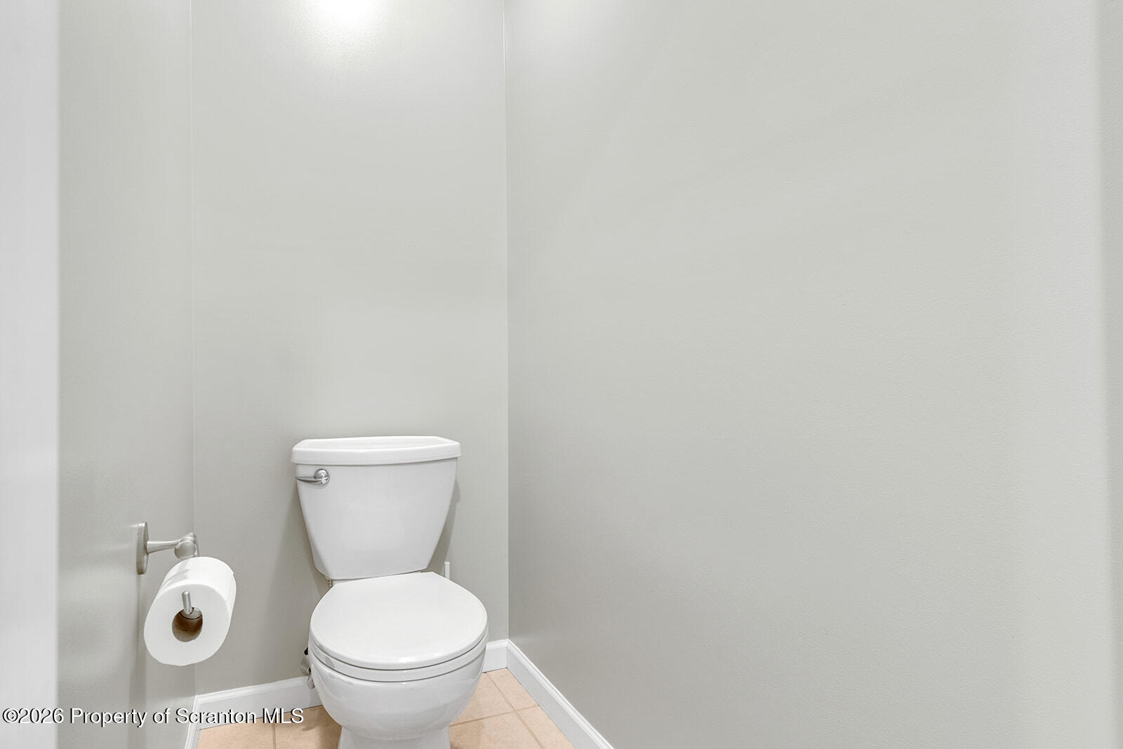 1611 Cherry Street Scranton, PA 18505 - Photo 65 of 90 a white toilet sitting next to a white wall