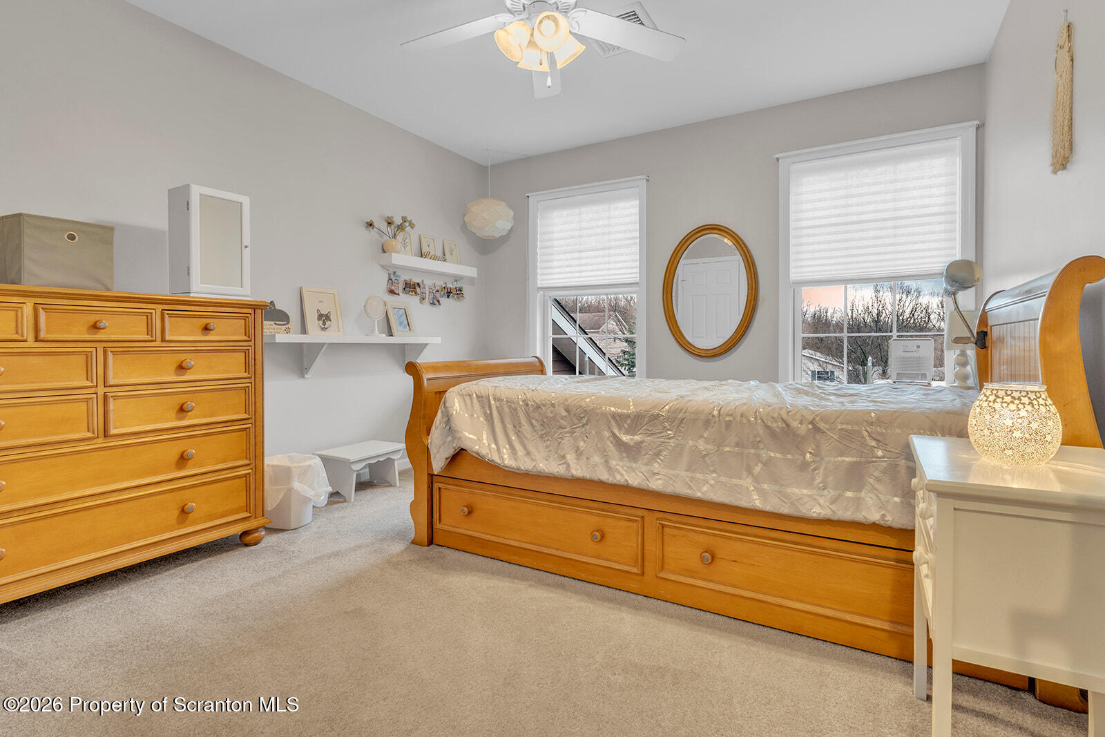 1611 Cherry Street Scranton, PA 18505 - Photo 66 of 86 a bedroom with a bed and a chandelier