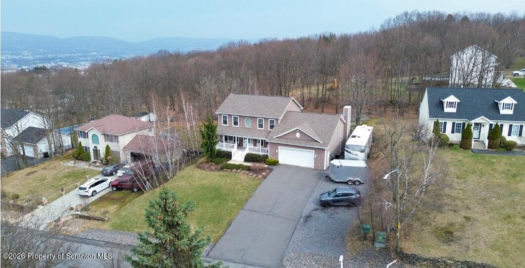 1611 Cherry Street Scranton, PA 18505 - Photo 87 of 90 an aerial view of a house with a yard and lake view