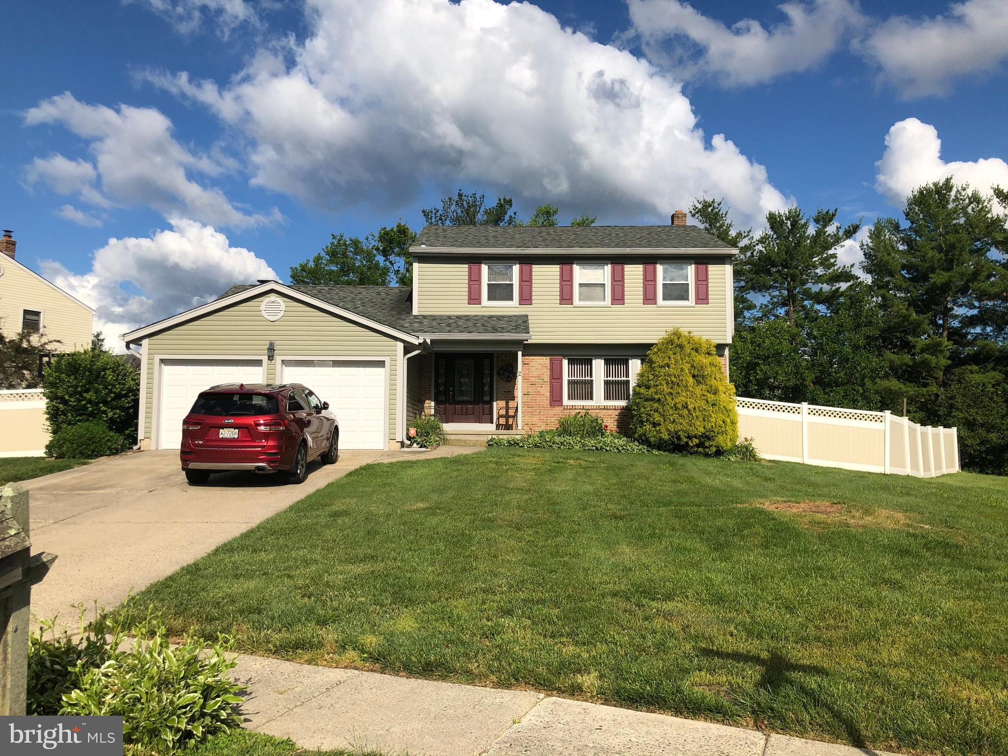 2 Candlestick Road Clementon, NJ 08021 - Photo 1 of 40 a front view of a house with a garden and yard
