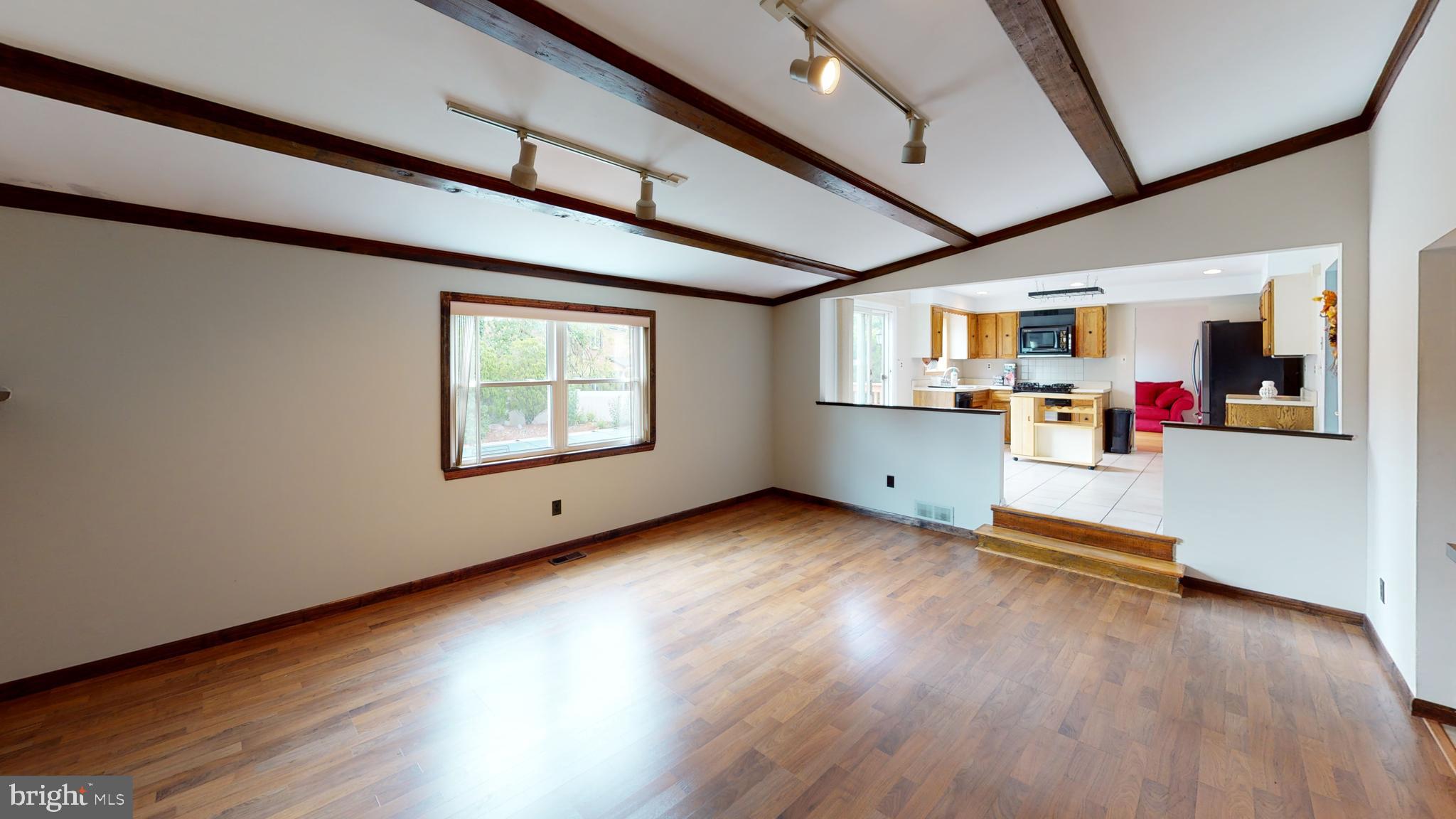 2 Candlestick Road Clementon, NJ 08021 - Photo 17 of 40 an empty room with wooden floor and windows