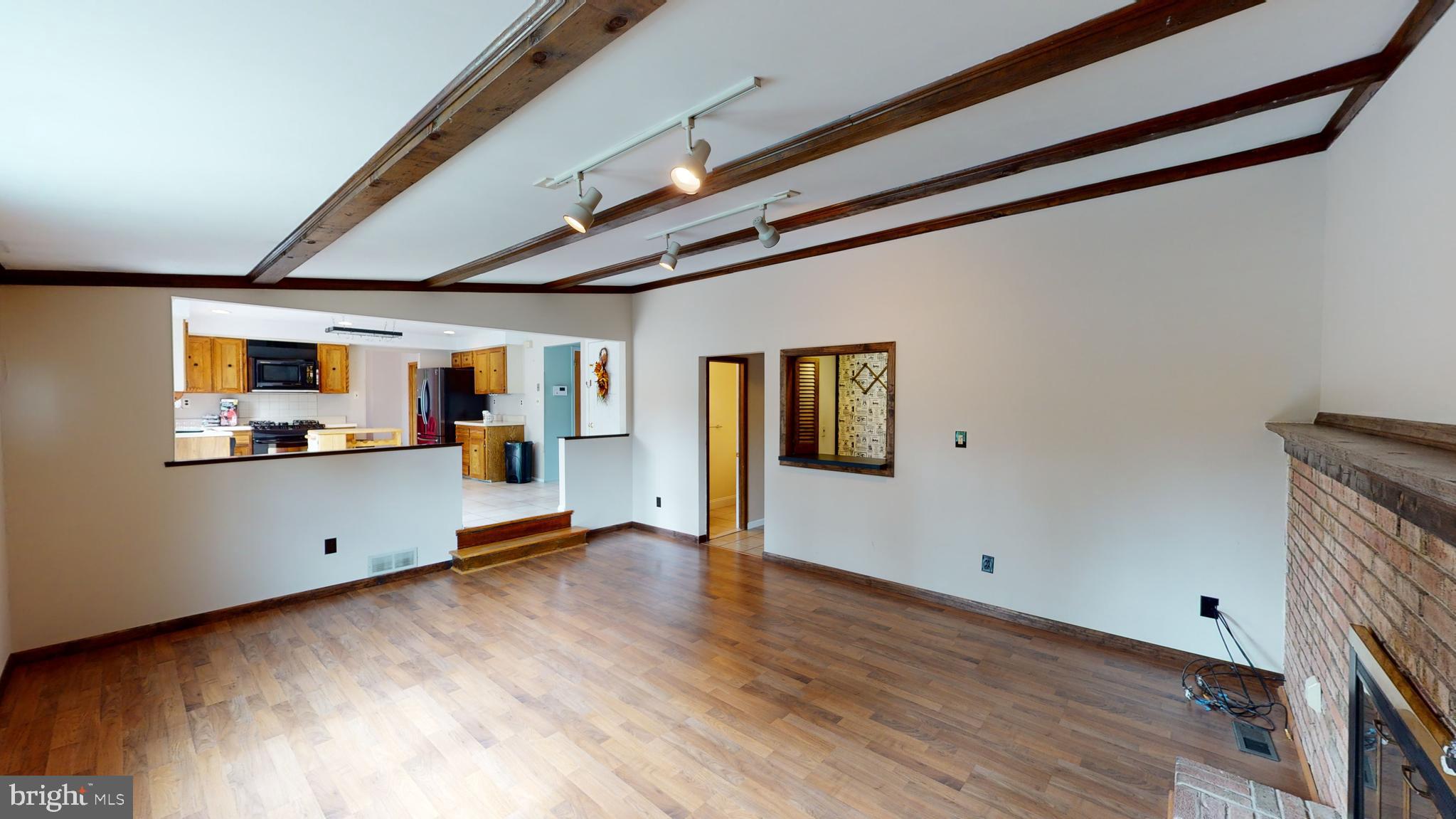 2 Candlestick Road Clementon, NJ 08021 - Photo 18 of 40 a view of room with window and wooden floor