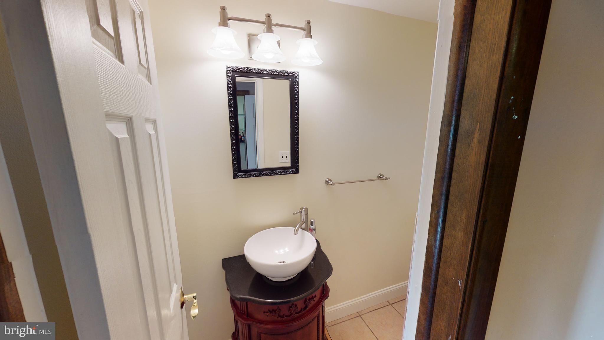 2 Candlestick Road Clementon, NJ 08021 - Photo 20 of 40 a bathroom with a toilet and a mirror