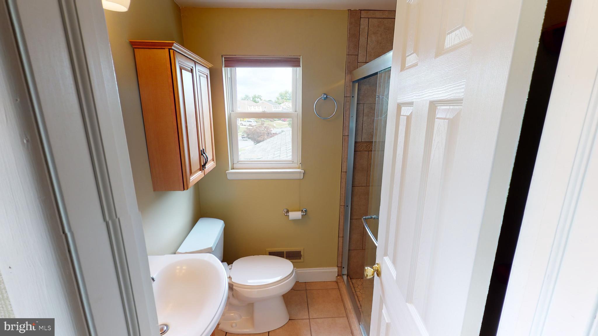 2 Candlestick Road Clementon, NJ 08021 - Photo 27 of 40 a white toilet sitting next to a bathroom sink