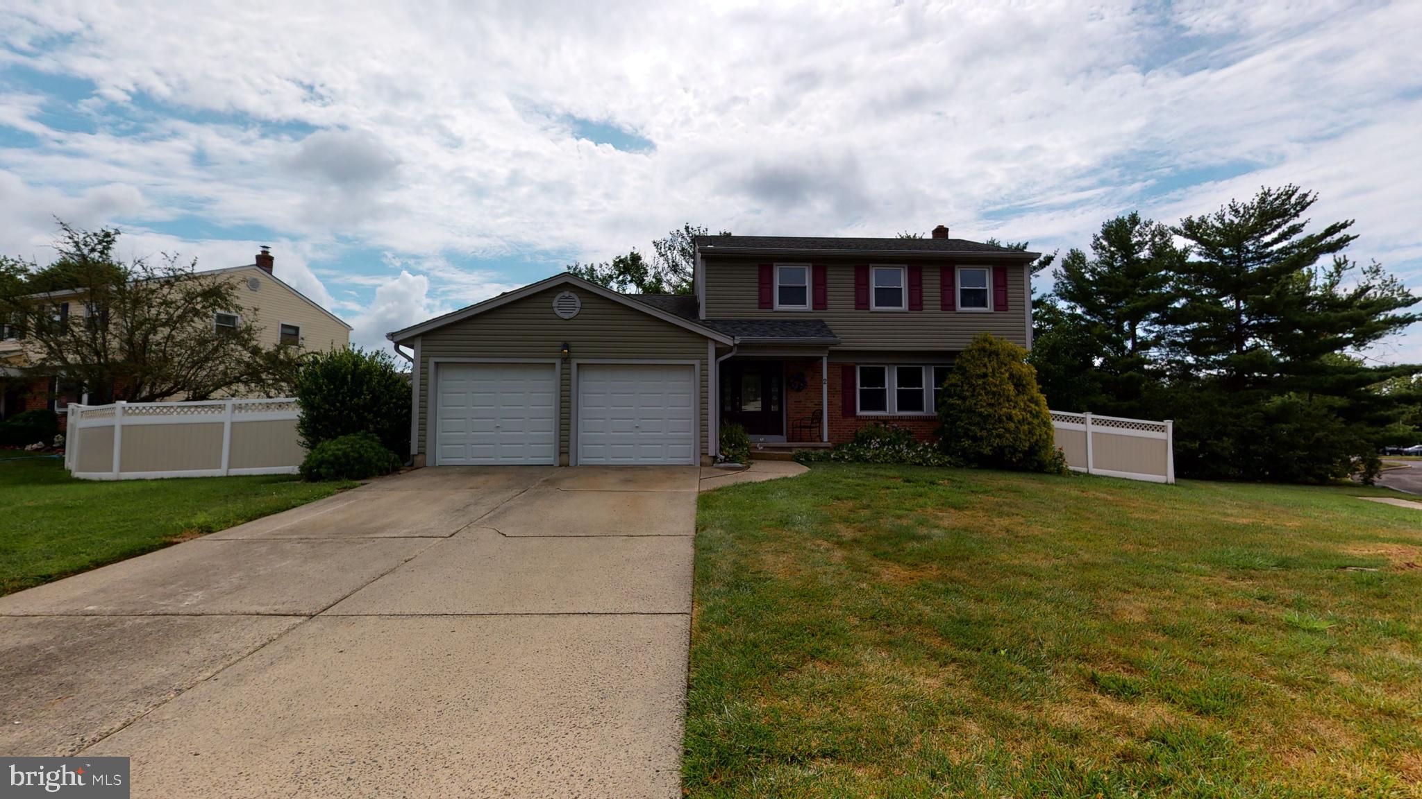 2 Candlestick Road Clementon, NJ 08021 - Photo 4 of 40 front view of a house with a garden