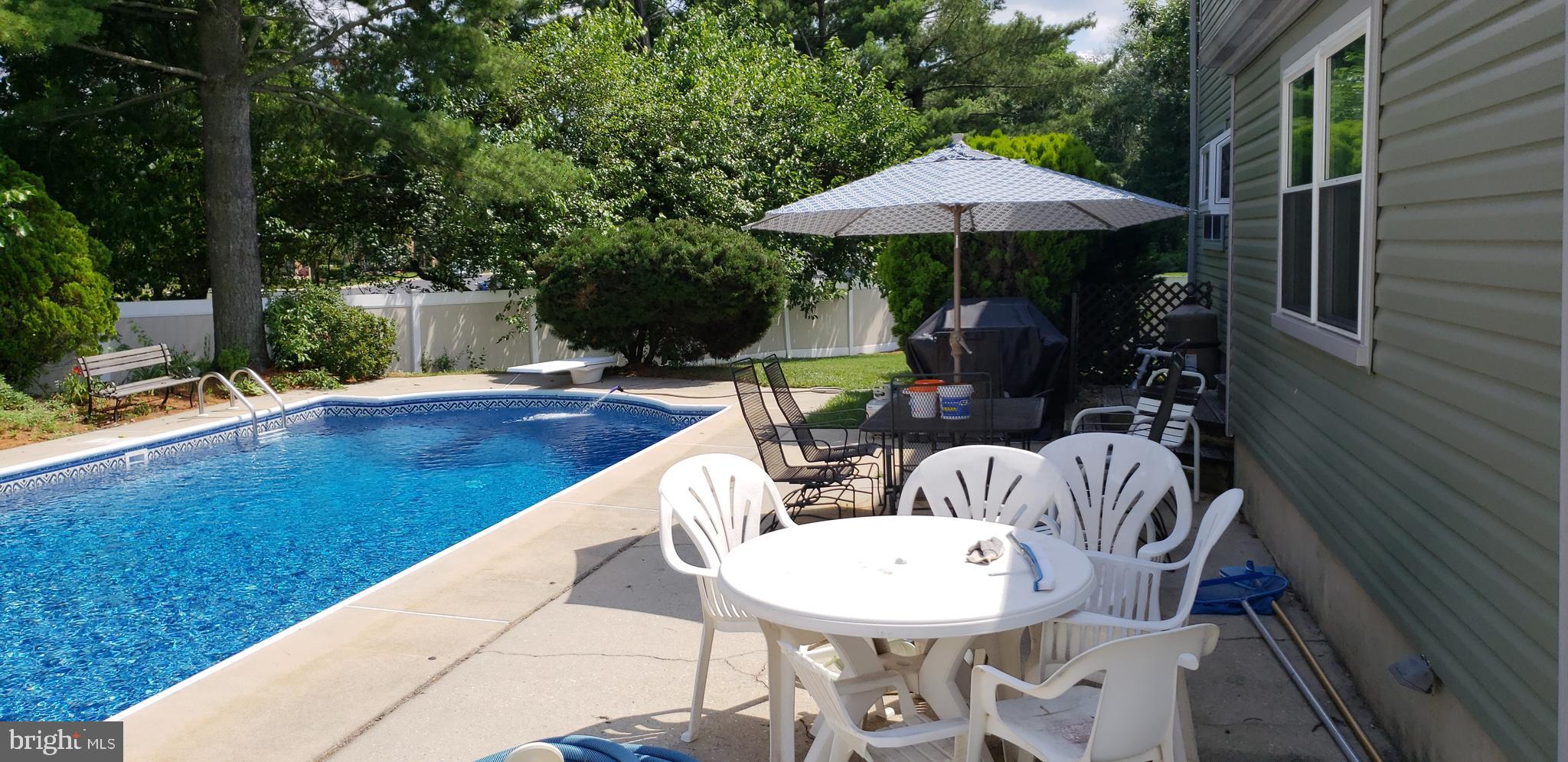 2 Candlestick Road Clementon, NJ 08021 - Photo 7 of 40 a view of deck with furniture and barbeque oven in the backyard