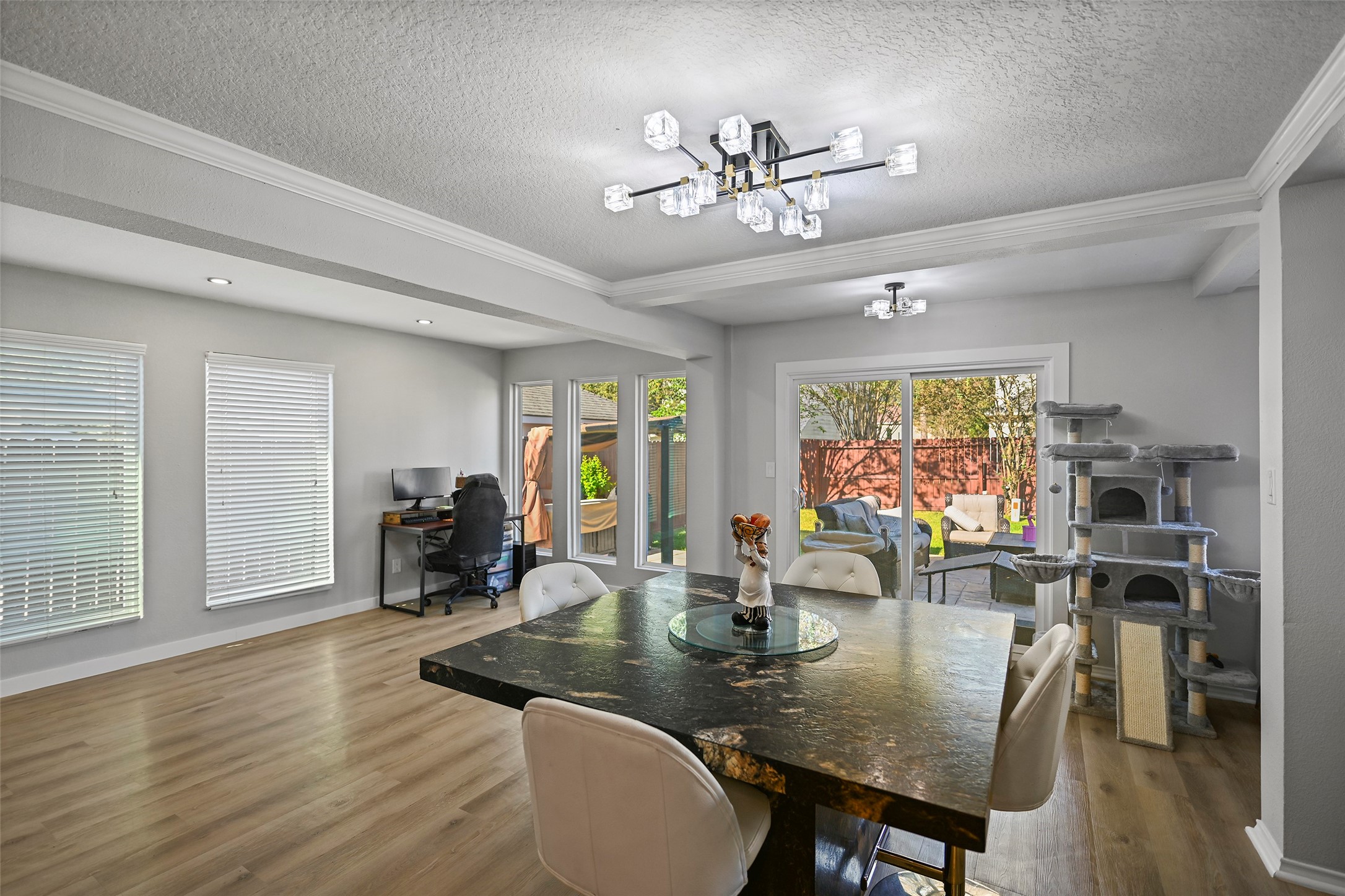 25119 Aughton Drive Spring, TX 77389 - Photo 14 of 41 a view of a dining room with furniture and wooden floor