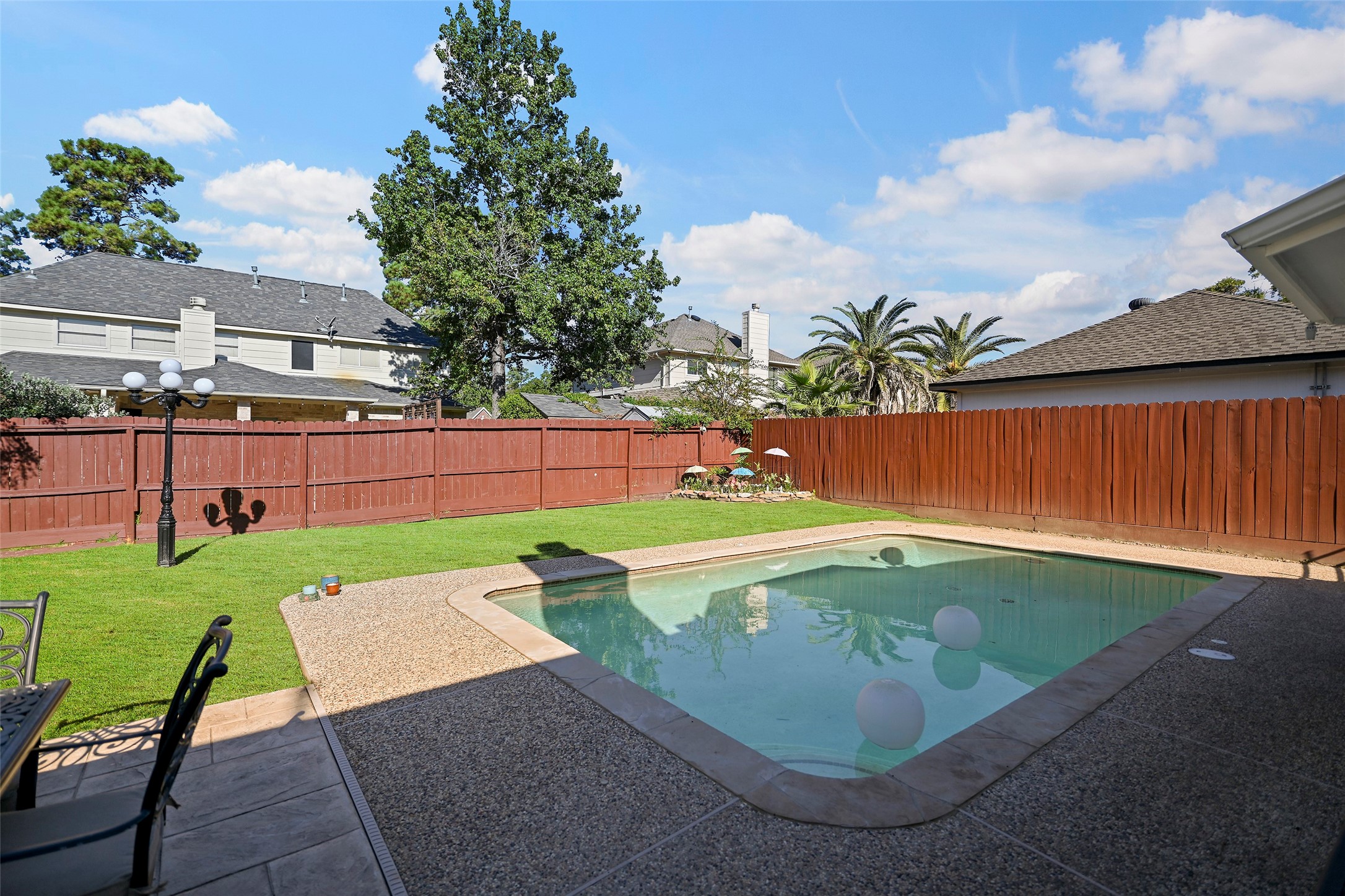25119 Aughton Drive Spring, TX 77389 - Photo 16 of 41 a view of a backyard with a garden