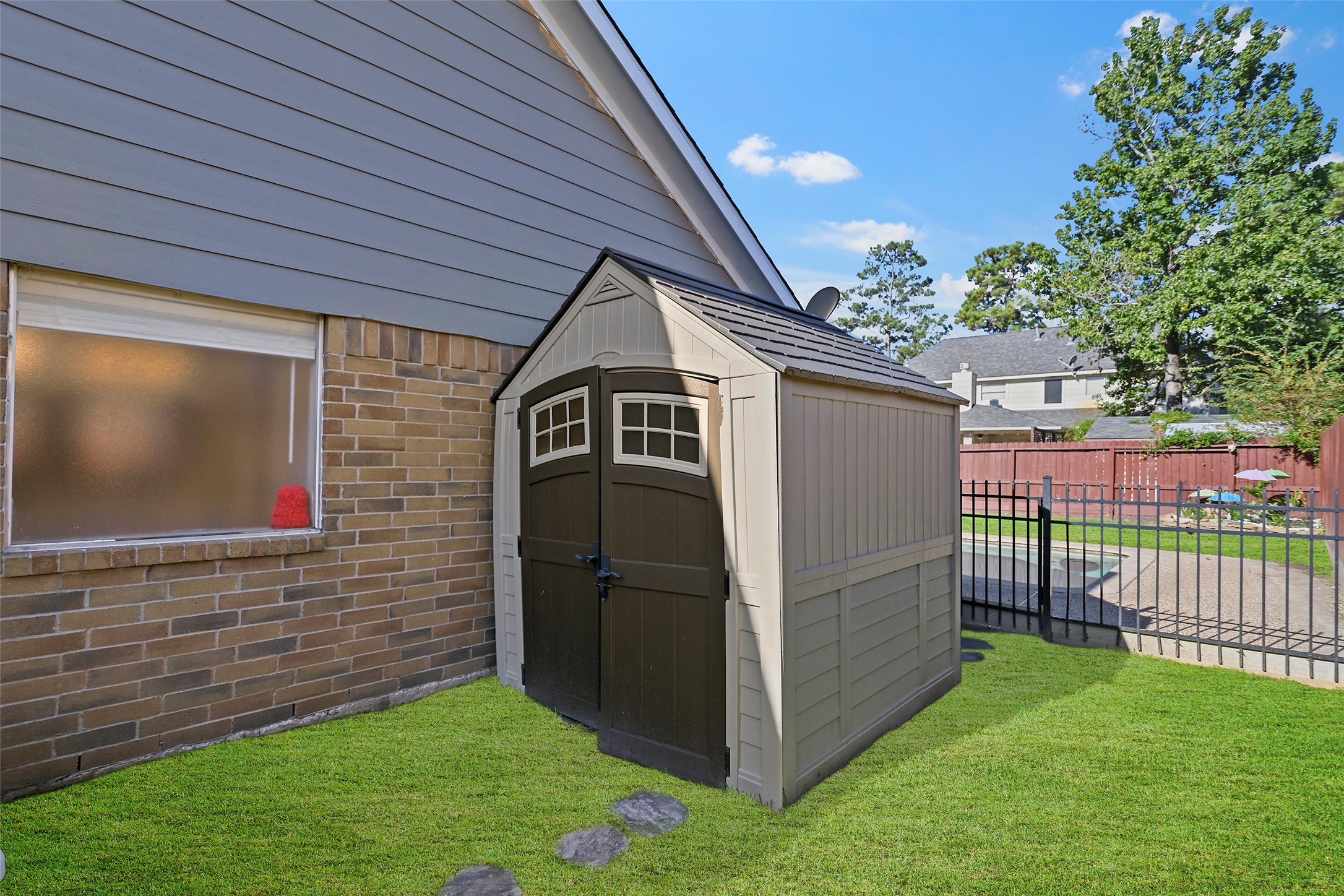 25119 Aughton Drive Spring, TX 77389 - Photo 19 of 41 a view of a backyard with a garden