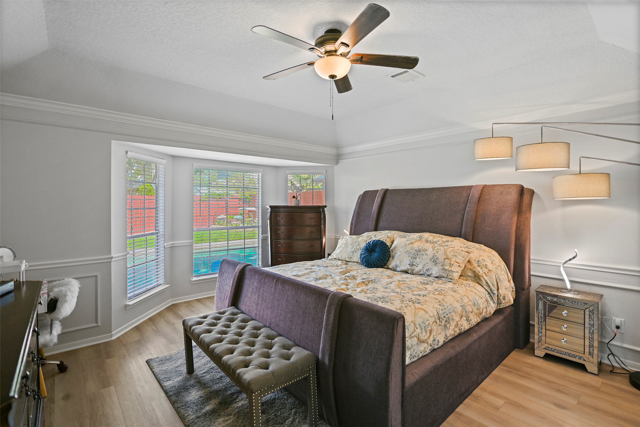 25119 Aughton Drive Spring, TX 77389 - Photo 21 of 41 a bedroom with a bed and a couch