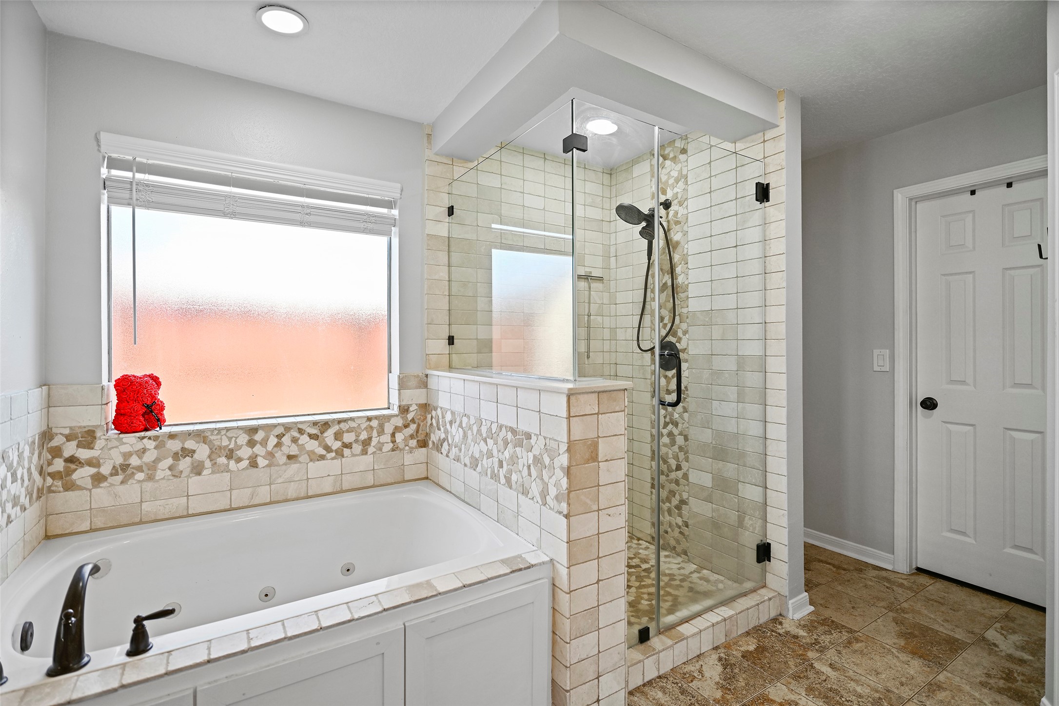 25119 Aughton Drive Spring, TX 77389 - Photo 23 of 41 a bathroom with a shower and a sink