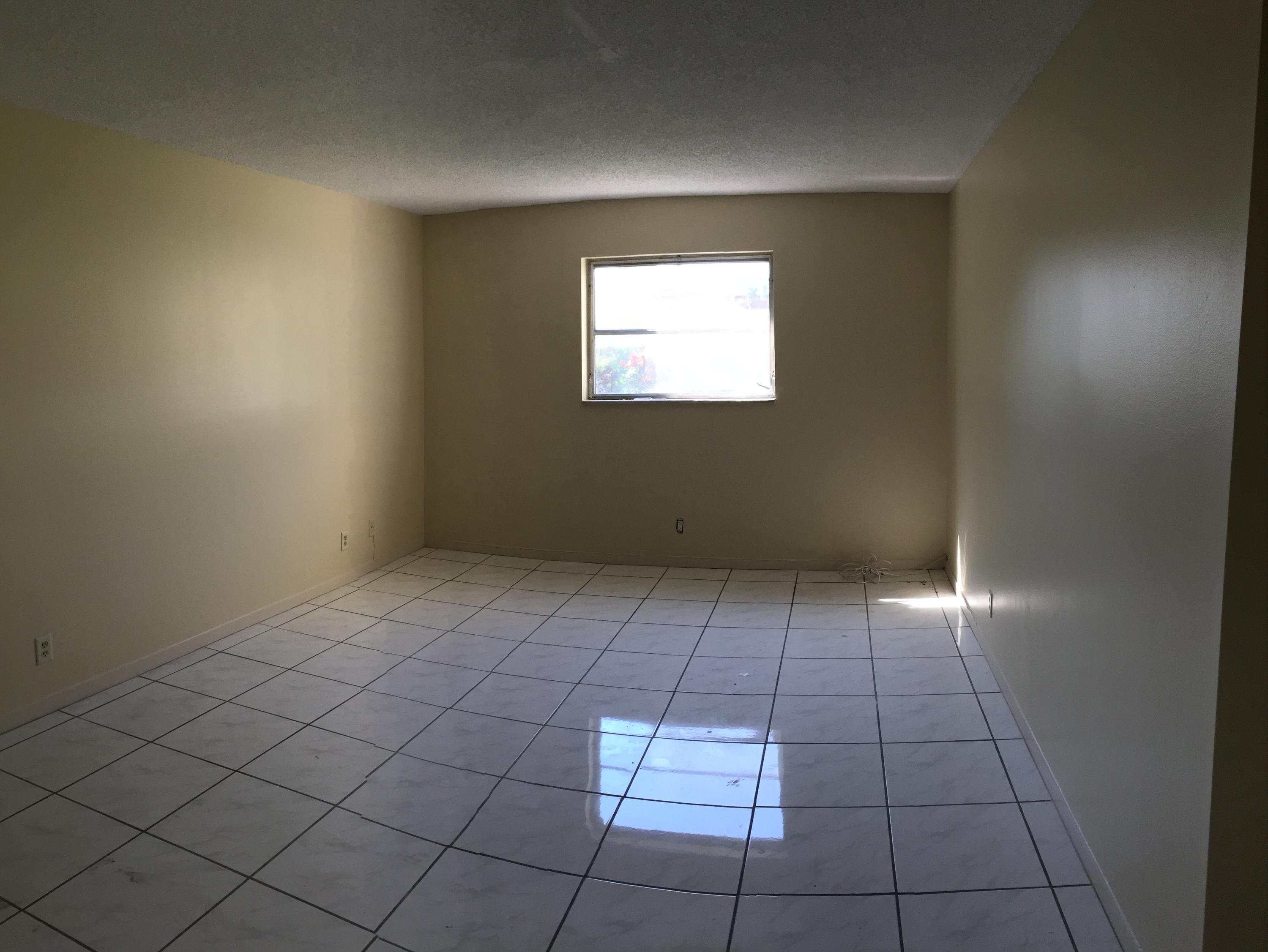22735 Southwest 66th Avenue, Unit 107 Boca Raton, FL 33428 - Photo 5 of 9 Master Bedroom