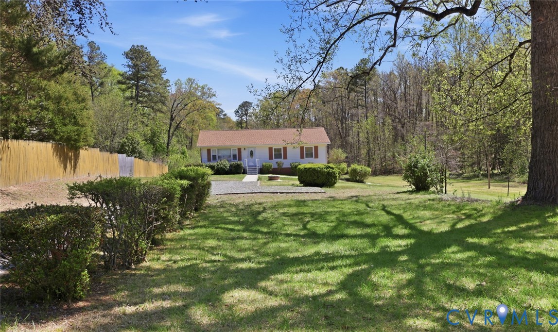 19353 Boulwares Road Ruther Glen, VA 22546 - Photo 8 of 62 View of front of home with view of wooded area