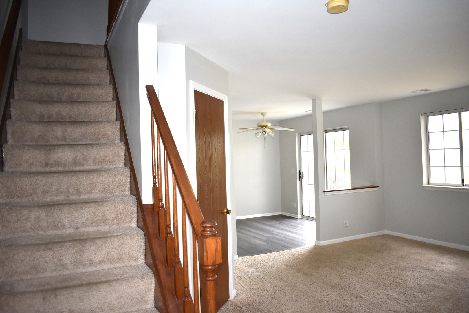 1344 South Lorraine Road, Unit F Wheaton, IL 60189 - Photo 20 of 27 a view of an entryway with staircase