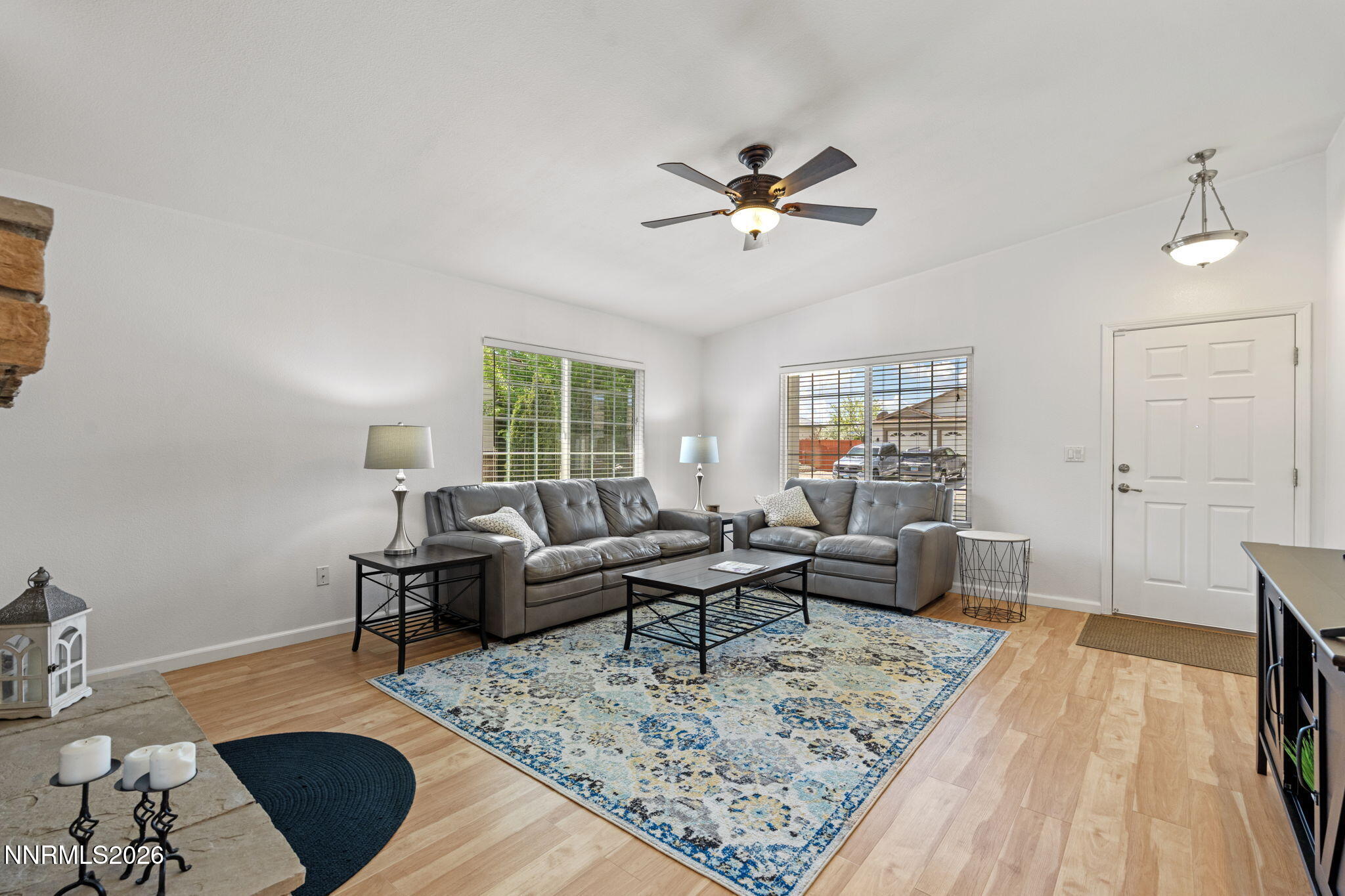 18324 Panda Bear Court Reno, NV 89508 - Photo 41 of 44 a living room with furniture and a rug