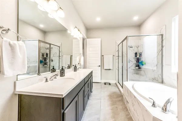 a kitchen with sink stove and cabinets