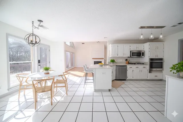 a view of balcony with wooden floor and fence