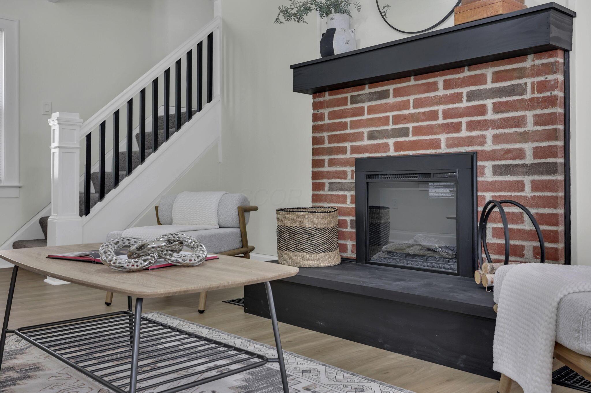 800 South Yearling Road Columbus, OH 43213 - Photo 13 of 57 Beautiful electric fireplace with new mantle and hearth!
