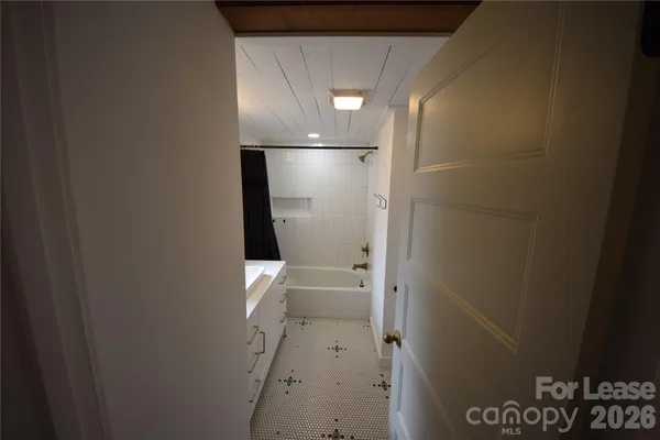 a bathroom with a bathtub
