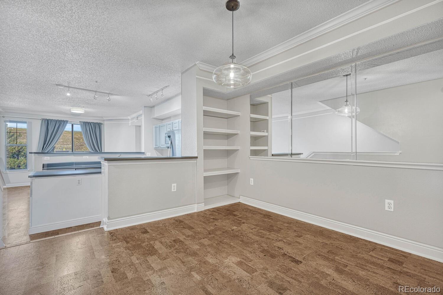 2149 Eagle Avenue Superior, CO 80027 - Photo 14 of 31 a view of a kitchen with refrigerator and microwave