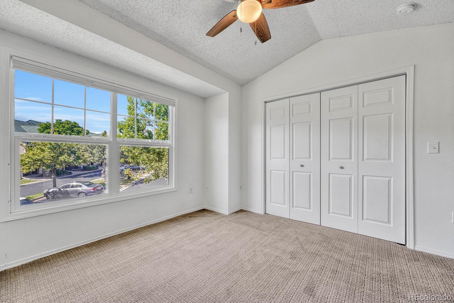 2149 Eagle Avenue Superior, CO 80027 - Photo 17 of 31 a view of a livingroom with a ceiling fan and window