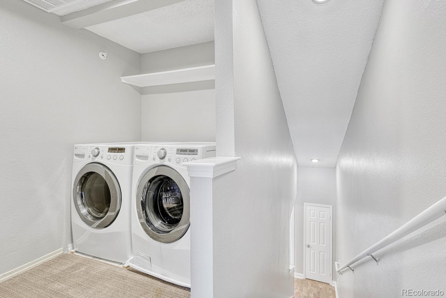2149 Eagle Avenue Superior, CO 80027 - Photo 19 of 31 a utility room with dryer and washer